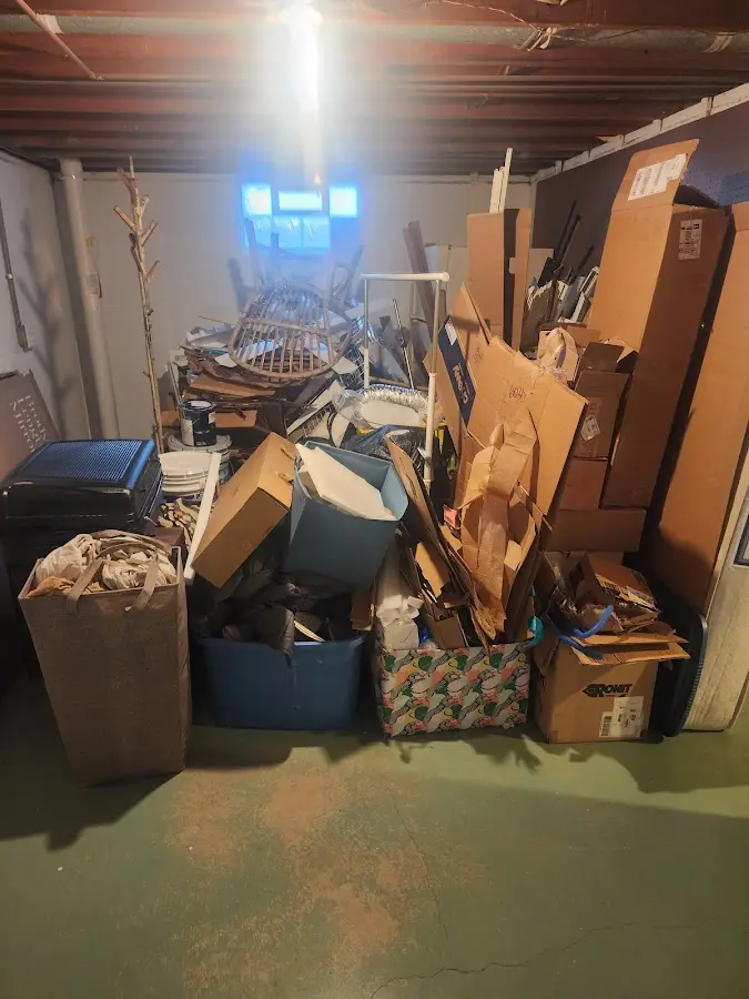 Roll-off dumpster container at job site for Yard Waste Dumpster Rental in Wilton